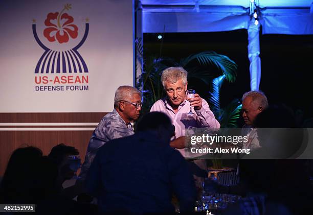 Secretary of Defense Chuck Hagel participates in a toast with Defense Minister of Indonesia Purnomo Yusgiantoro , and National Defense Secretary of...