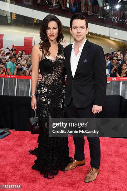 Actors America Olivo and Christian Campbell attend the "Mission Impossible - Rogue Nation" New York premiere at Duffy Square in Times Square on July...