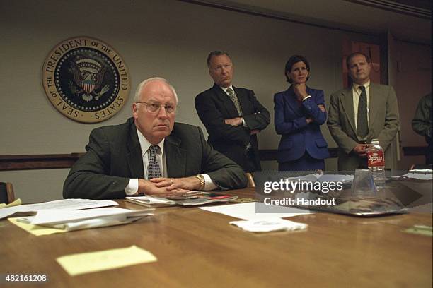 In this handout photo provided by the U.S. National Archives, Vice President Dick Cheney meets with senior staff in the President's Emergency...