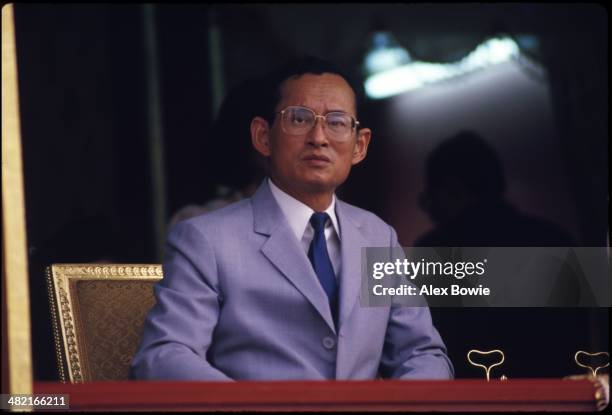 King Bhumibol Adulyadej seen during the visit of Malcolm Forbes , US publisher of Forbes magazine, during the launch of a US$80 90-foot-tall...