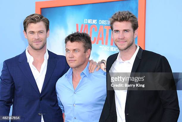 Actors/brothers Chris Hemsworth, Luke Hemsworth and Liam Hemsworth arrive at the Premiere Of Warner Bros. 'Vacation' at Regency Village Theatre on...