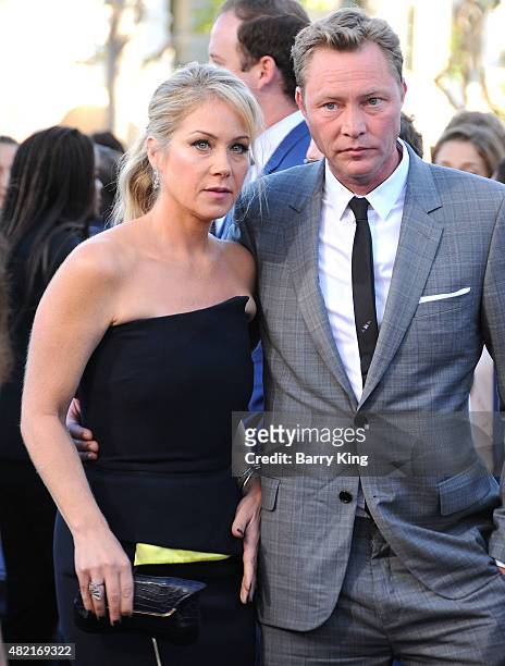 Actress Christina Applegate and husband Martyn LeNoble arrive at the Premiere Of Warner Bros. 'Vacation' at Regency Village Theatre on July 27, 2015...