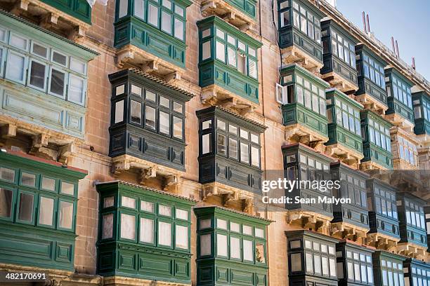 typical balconies, valletta, malta - sean malyon stockfoto's en -beelden