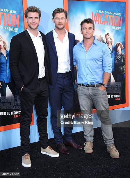 Actors/brothers Liam Hemsworth, Chris Hemsworth and Luke Hemsworth arrive at the Premiere Of Warner Bros. 'Vacation' at Regency Village Theatre on...
