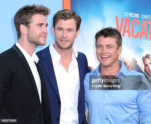 Actors/brothers Liam Hemsworth, Chris Hemsworth and Luke Hemsworth arrive at the Premiere Of Warner Bros. 'Vacation' at Regency Village Theatre on...