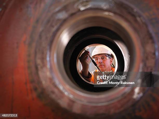 engineer working on excavator parts in surface coal mine - mining machinery bildbanksfoton och bilder