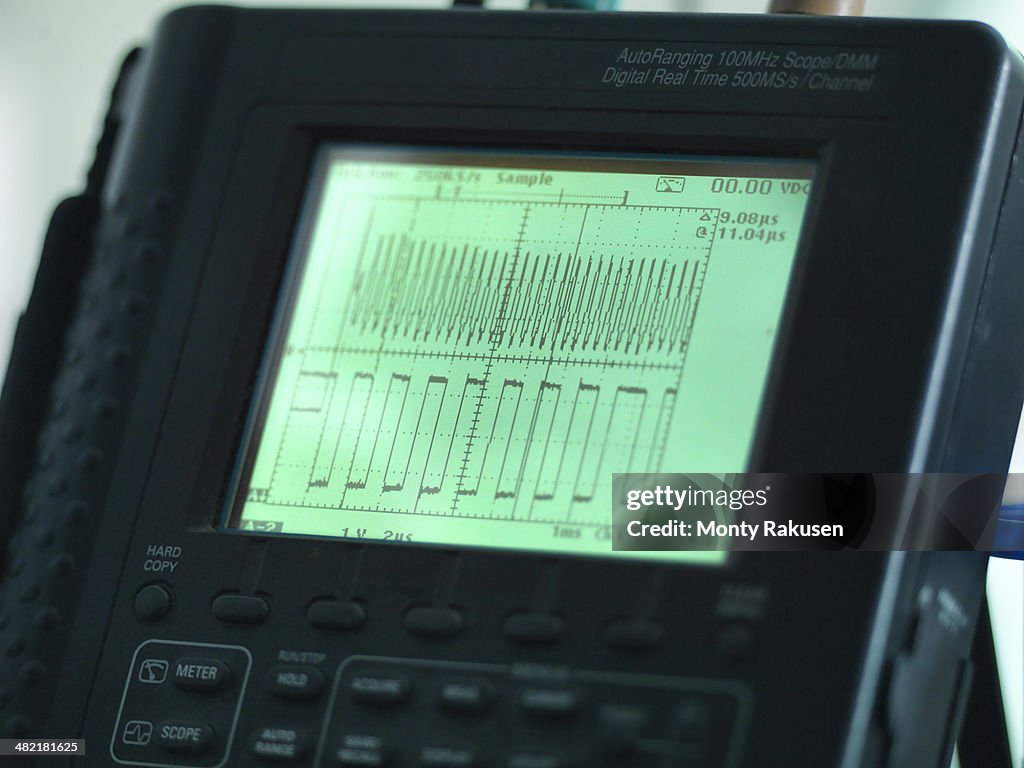 Close up of oscilloscope, used for testing circuit boards
