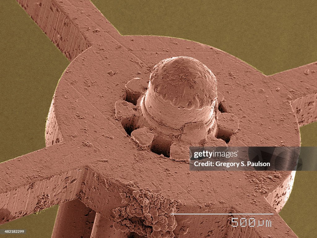 Coloured SEM of watch part