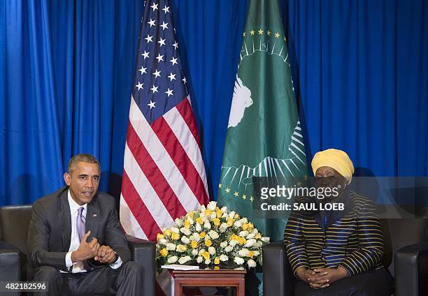 African Union Chairperson Nkosazana Dlamini Zuma listens to US President Barack Obama during a meeting at the African Union Headquarters in Addis...