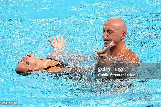 Virginie Dedieu and Benoit Beaufils of France compete in the Mixed Duet Free Synchronised Swimming Preliminary on day four of the 16th FINA World...