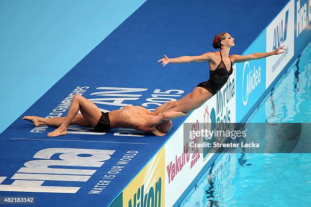 Virginie Dedieu and Benoit Beaufils of France compete in the Mixed Duet Free Synchronised Swimming Preliminary on day four of the 16th FINA World...