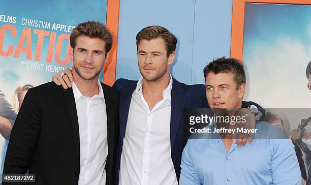 Actor/brothers Chris Hemsworth; Liam Hemsworth; Luke Hemsworth arrives at the Premiere Of Warner Bros. 'Vacation' at Regency Village Theatre on July...