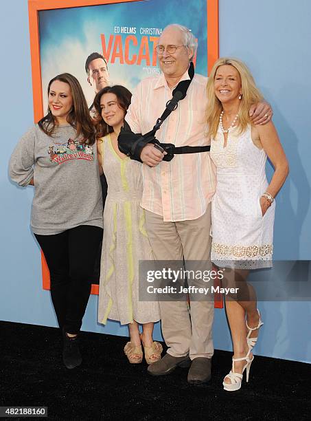 Emily Evelyn Chase, Caley Leigh Chase, actor Chevy Chase and wife Jayni Chase arrive at the Premiere Of Warner Bros. 'Vacation' at Regency Village...