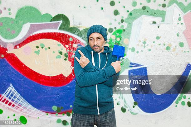 man making gang signs - graffiti artists stock pictures, royalty-free photos & images