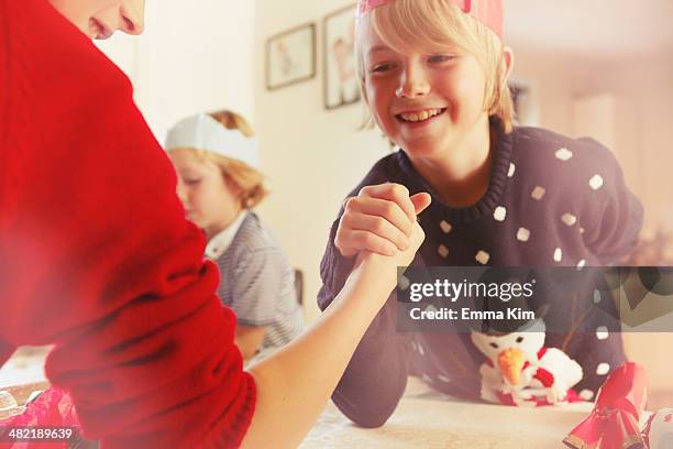 children arm-wrestling - speckled sussex stock pictures, royalty-free photos & images