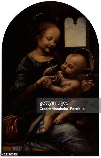 Russia, St. Petersburg, The State Hermitage Museum. Whole artwork view. Mary holding baby Jesus with a flower in his little hand.