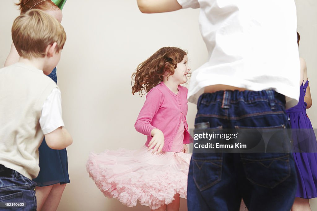Children dancing at birthday party