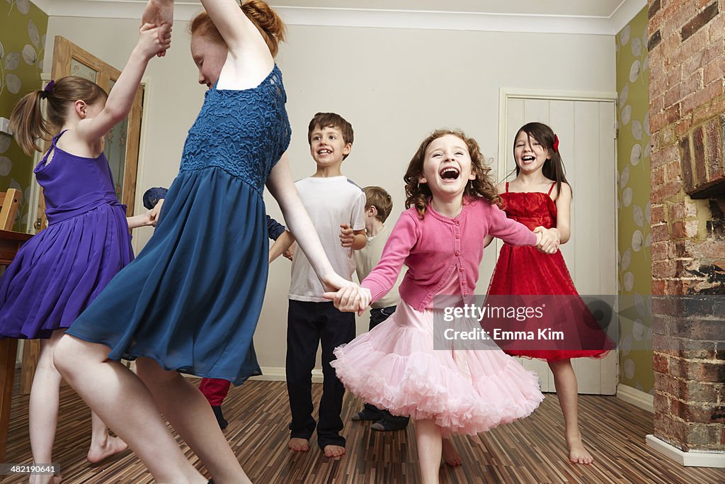 Children dancing at birthday party
