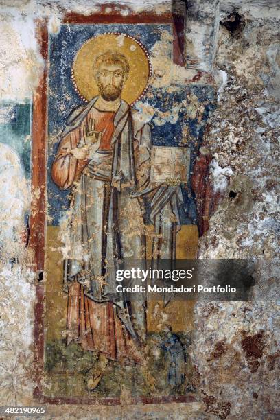 Italy, Puglia, Monopoli, Chript of Saint Cecilia. Detail. A saint stand with open book in a frame.