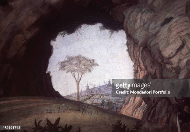 Italy, Lombardy, Mantua, Ducale Palace. Detail. Detail of the western wall: the natural rock arch that frames a tree and a city.