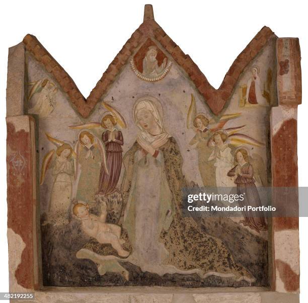Italy, Lombardy, Carpenedolo, Romanesque Church of Saint Mary in Carpino. Whole artwork view. Triptych with cuspidated terracotta frame depicting a...