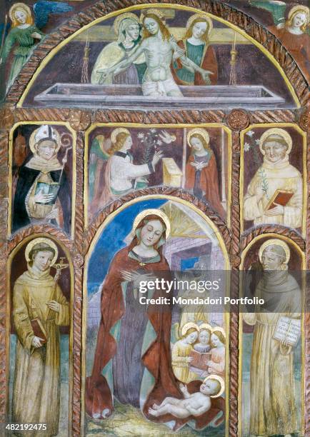 Italy, Lombardy, Castiglione d'Adda, Church of Saint Bernardino. Whole artwork view. Frescoed polyptic with a clay frame. In the central panel an...