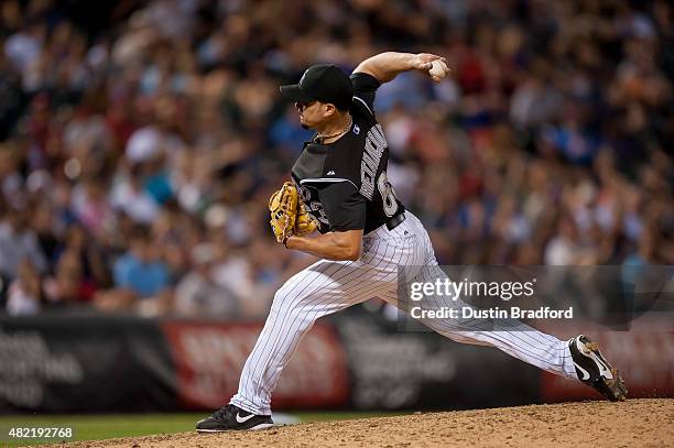 Rafael Betancourt of the Colorado Rockies pitches against the Cincinnati Reds in the ninth inning of a game at Coors Field on July 25, 2015 in...