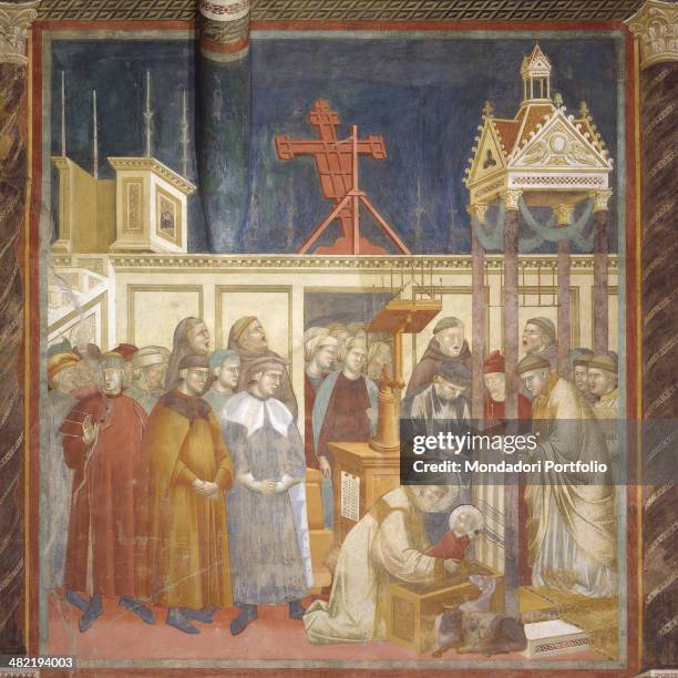 Italy, Umbria, Assisi, Papal Basilica of San Francesco, Upper Church. Whole artwork view. St. Francis, leaning over the manger, takes in his arms the...