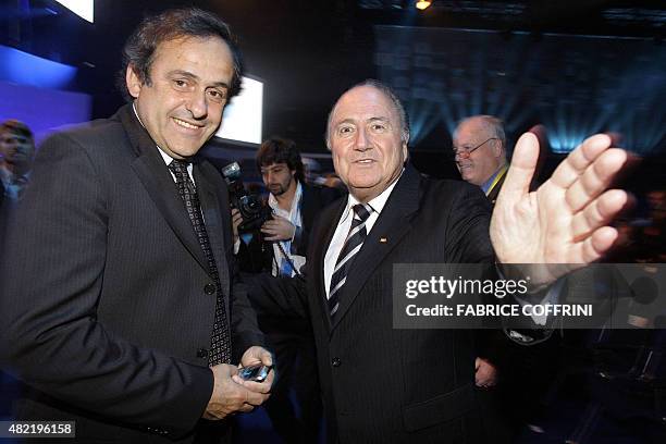 President Sepp Blatter gestures next to UEFA President Michel Platini prior to the opening ceremony of the 57th congress of the World football's...