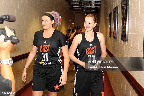 Stefanie Dolson and Emma Meesseman of the Eastern Conference All Stars walk to the court before the Boost Mobile WNBA All-Star 2015 Game at the...