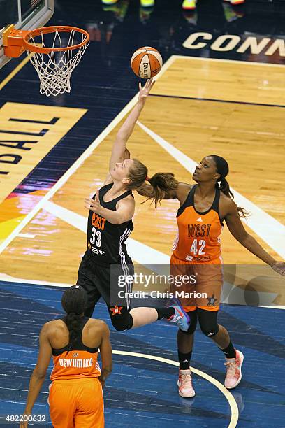 Emma Meesseman of the Eastern Conference All Stars drives to the basket against the Western Conference All Stars during the Boost Mobile WNBA...