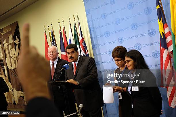 Venezuelan President Nicolas Maduro speaks to the media following a meeting with UN chief Ban Ki-moon at the United Nations headquarters in New York...