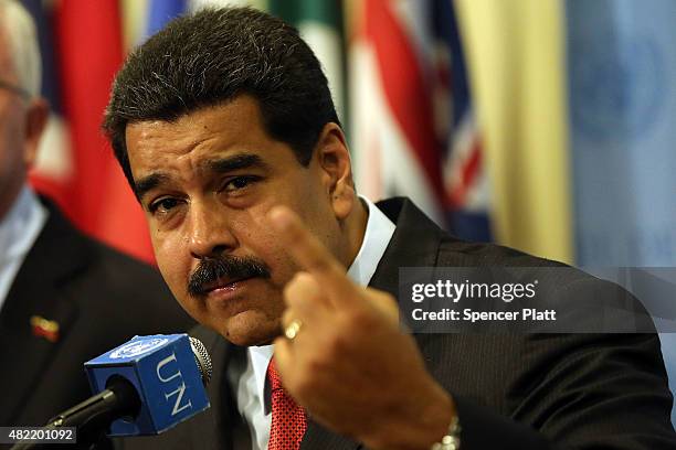 Venezuelan President Nicolas Maduro speaks to the media following a meeting with UN chief Ban Ki-moon at the United Nations headquarters in New York...