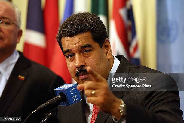 Venezuelan President Nicolas Maduro speaks to the media following a meeting with UN chief Ban Ki-moon at the United Nations headquarters in New York...