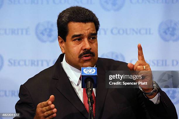 Venezuelan President Nicolas Maduro speaks to the media following a meeting with UN chief Ban Ki-moon at the United Nations headquarters in New York...