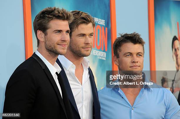 Actors/brothers Liam Hemsworth, Luke Hemsworth and Chris Hemsworth arrive for the Premiere Of Warner Bros. Pictures' "Vacation" held at Regency...