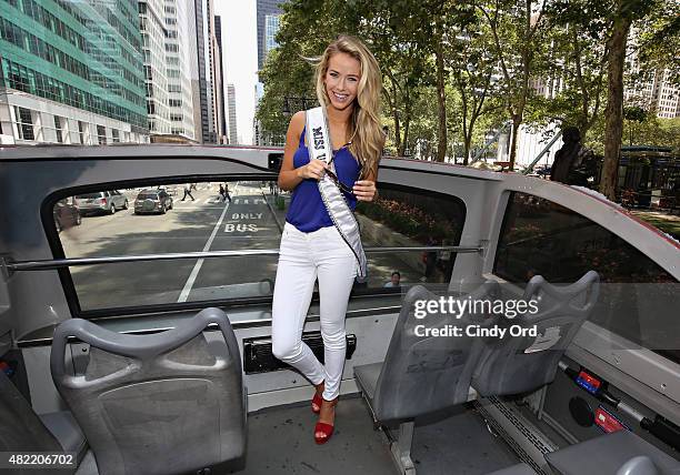 Miss USA 2015 Olivia Jordan takes a ride on the Gray Line CitySightseeing NYC bus on July 28, 2015 in New York City.