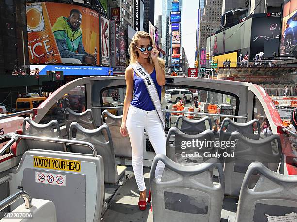 Miss USA 2015 Olivia Jordan takes a ride on the Gray Line CitySightseeing NYC bus on July 28, 2015 in New York City.