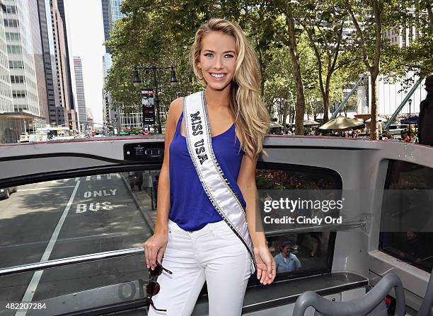 Miss USA 2015 Olivia Jordan takes a ride on the Gray Line CitySightseeing NYC bus on July 28, 2015 in New York City.