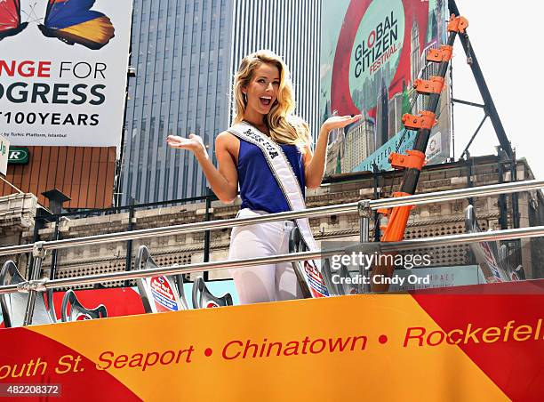 Miss USA 2015 Olivia Jordan takes a ride on the Gray Line CitySightseeing NYC bus on July 28, 2015 in New York City.