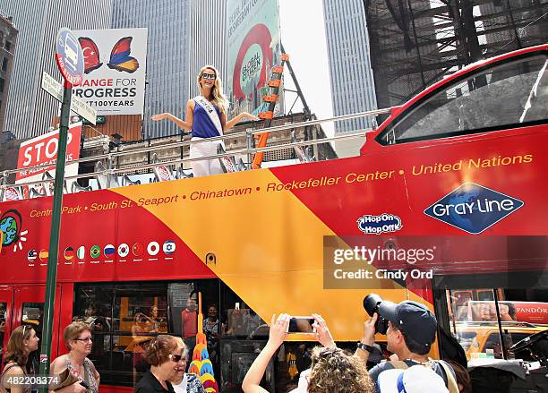 Miss USA 2015 Olivia Jordan takes a ride on the Gray Line CitySightseeing NYC bus on July 28, 2015 in New York City.