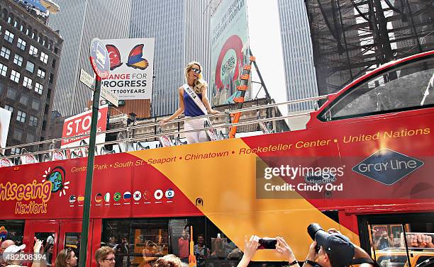 Miss USA 2015 Olivia Jordan takes a ride on the Gray Line CitySightseeing NYC bus on July 28, 2015 in New York City.