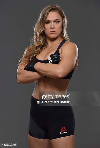 Women's bantamweight champion Ronda Rousey poses for a portrait during a UFC photo session at the Sheraton Rio Hotel on July 28, 2015 in Rio de...