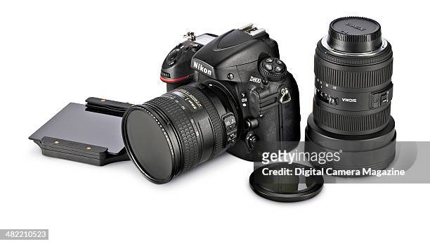 Nikon D800 DSLR alongside a Sigma lens, ND graduated filter and polariser photographed on a white background, taken on July 22, 2013.