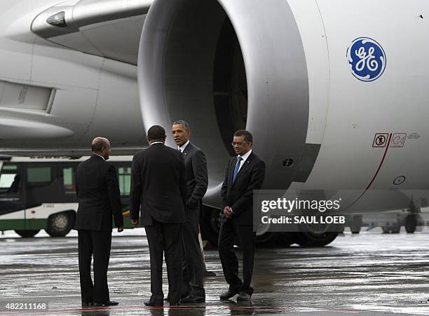 President Barack Obama talks with Ethiopian Prime Minister Hailemariam Desalegn , and Ethiopian Airlines CEO Tewolde Gebremariam , about the...