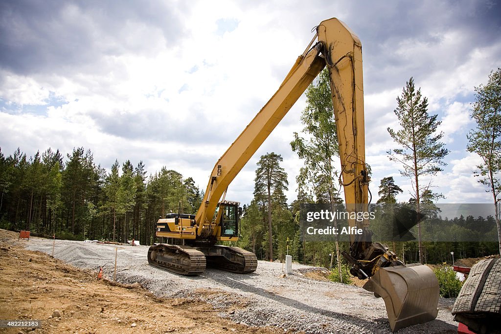 Mechanical digger on a building site