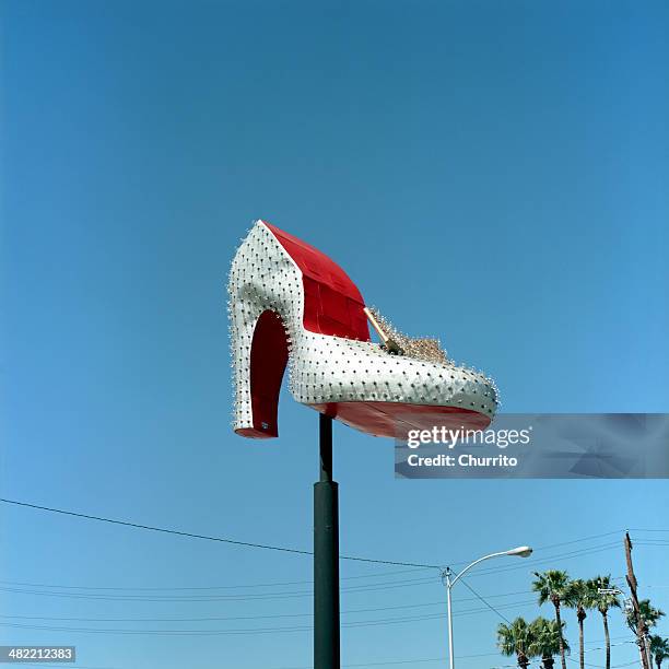 high heel monument against clear sky - high angle view stockfoto's en -beelden