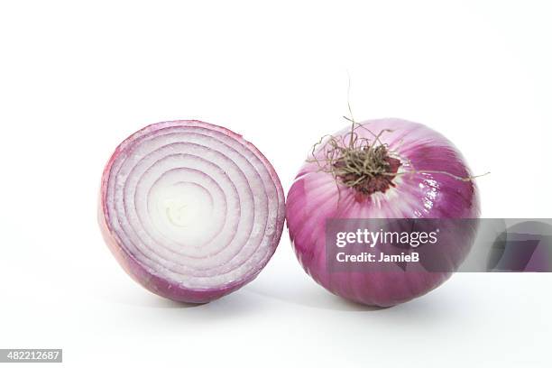 red onion cut in half - red onion white background stock pictures, royalty-free photos & images