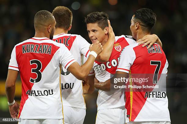 Guido Carrillo of AS Monaco celebrates with his teammates after scoring his team's second goal during the UEFA Champions League third qualifying...