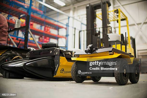 The Kingfisher, left, and Jackal robots sit at the Clearpath Robotics Inc. Facility in Kitchener, Ontario, Canada, on Friday, July 24, 2015....